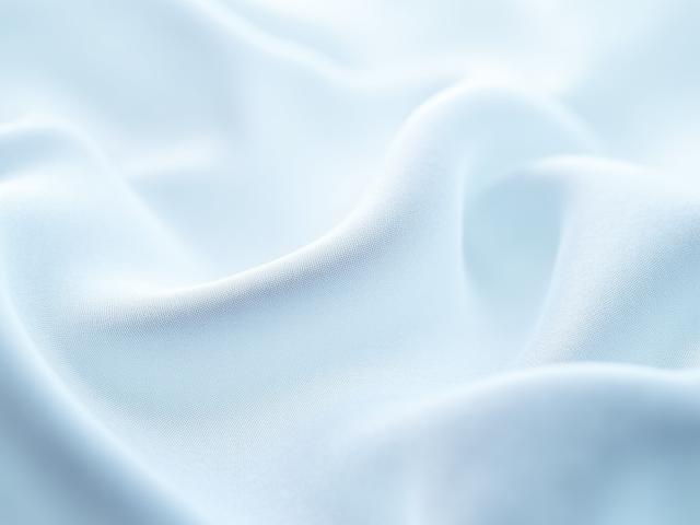 Macro shot of silk fabric with red wine stain removed